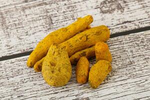 Indian spices - Turmeric root Curcuma photo