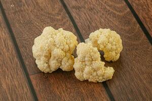 Raw white cauliflower cabbage heap photo