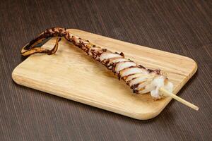 Delicous tasty Grilled octopus tentacle photo