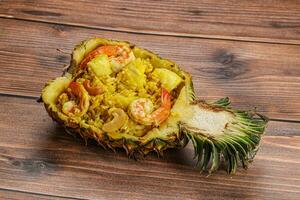 Thai cuisine - rice with prawn in pineapple photo