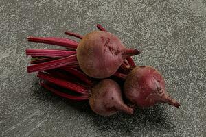 Young raw beetroot heap isolated photo