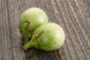 Raw green round eggplant vegetable photo