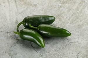 Raw green Mexican jalapeno pepper photo