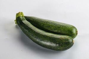 Raw young small green zucchini photo