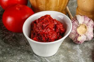 Natural organic red tomato paste photo