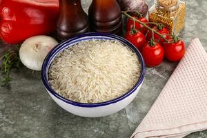 Raw delicous basmati rice heap photo