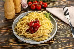 Italian pasta spaghetti with tomato photo