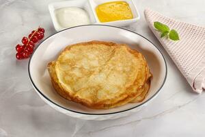 Sweet homemade thick baked pancakes photo