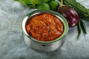 Indian cuisine - butter chicken with sauce photo