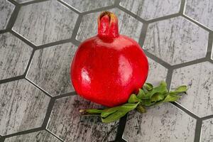 Ripe red sweet and juicy Pomegranate photo