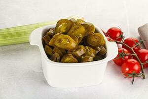 Sliced canned jalapeno pepper photo