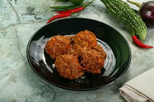 Kashmiri aloo dum - potato stuffed cheese photo