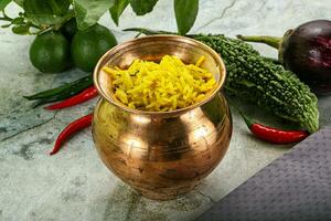 Indian cuisine - Lemon rice with spices photo