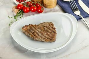 Grilled marble beef steak with sauce photo