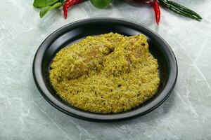 Indian cuisine - pork masala sauce photo