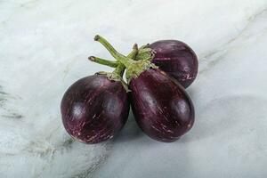 Raw smal asian baby eggplant photo