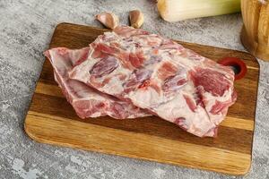 Raw pork ribs for barbecue photo