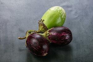 Heap of raw asian baby eggplant photo