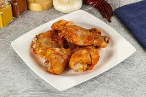 Raw marinated chicken drumstick for cooking photo