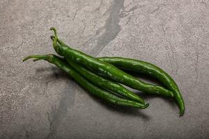 Hot and spicy green chili pepper photo