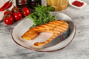 Tasty delicous grilled salmon steak photo