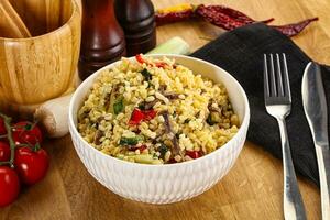 Bulgur with lamb and vegetables photo