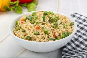 Indian vegetarian cuisine rice with vegetables photo