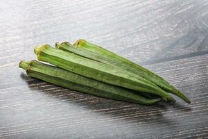 Green ripe tasty okra tropical vegetable photo