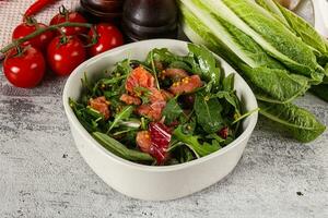 Salad with salmon and arugula photo