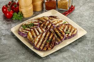 Grilled eggplant slices with cilantro photo