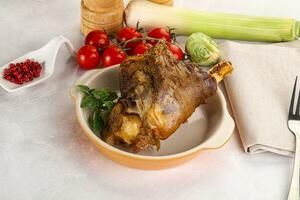 Baked Lamb shank with bone photo