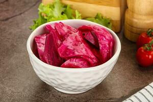 Red pickled cabbage with beetroot photo