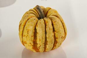 Decorative ripe Pumpkin isolated background photo