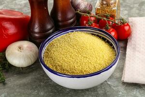 Raw dry wheat couscous grain photo
