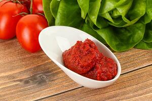 Tomato puree sauce for cooking photo