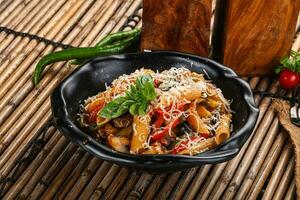 Vegetarian pasta penne with mushroom photo