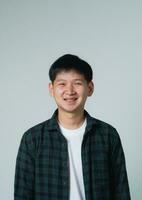 Asian man braces. Teeth braces on the white teeth of man to equalize the teeth. Bracket system in smiling mouth, close up photo teeth, macro shot, dentist health concept.