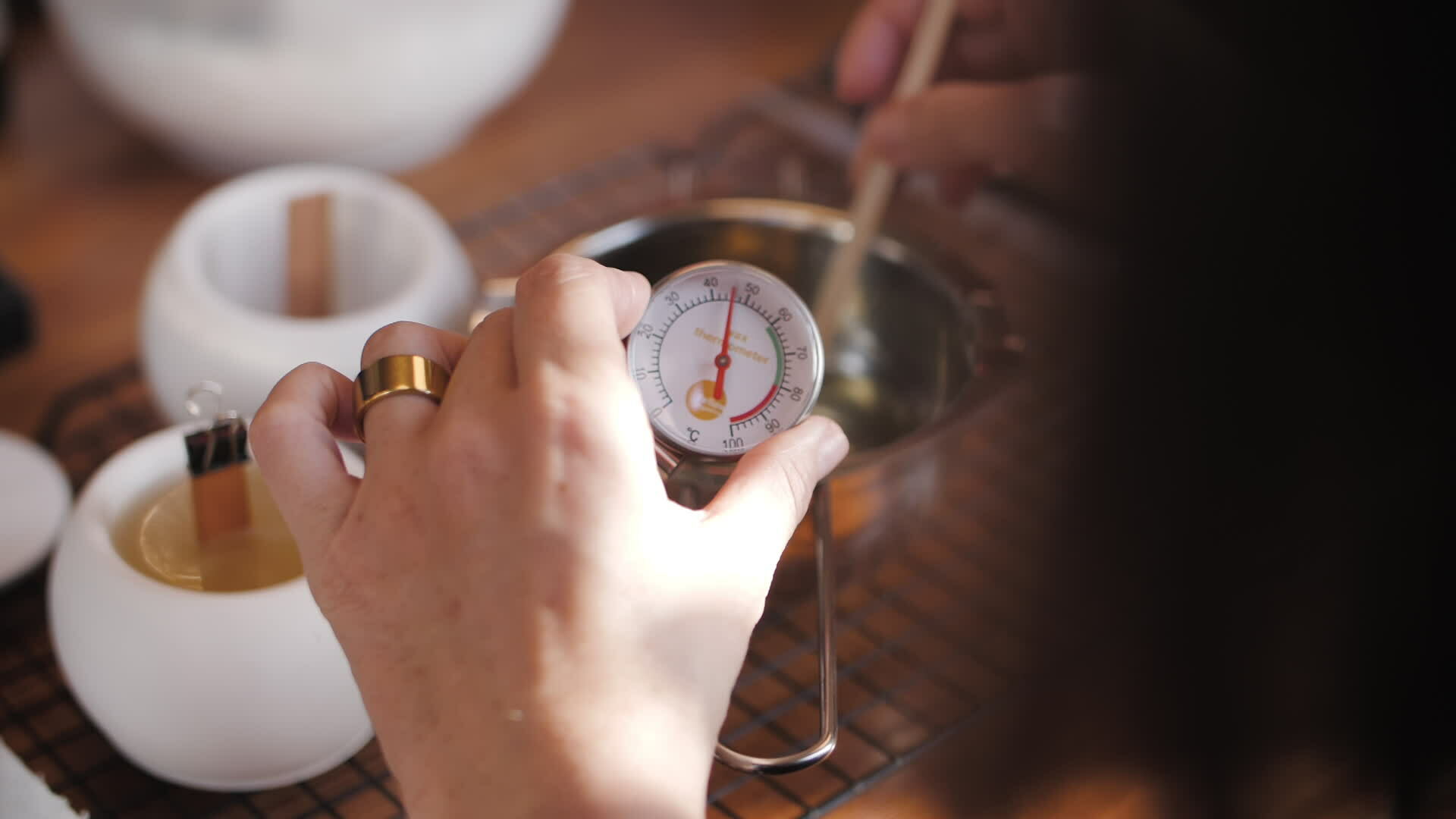 candle making and control of wax melting temperature 36242724 Stock