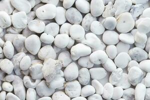 White pebbles stone texture and background photo