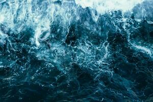 Rough stormy blue ocean waves photo