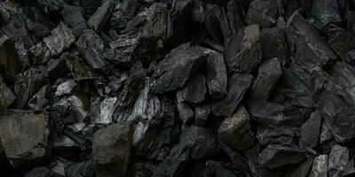 black coal background. charcoal woody black.  lot of wood photo