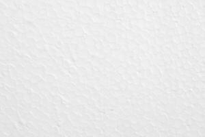 Close up plastic white foam sheet surface texture background photo
