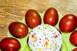 Easter cake and painted red Easter eggs. Food for the Easter table. photo