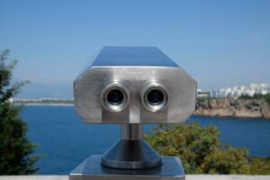 Inspection binoculars on the waterfront. photo