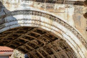 The arch of the gate of Hadrian. photo