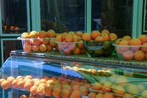 Oranges on the counter. Selling oranges. Citrus photo