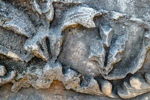 The element of the gate of Hadrian on the ground near the gate. Ruins of ancient construction. photo