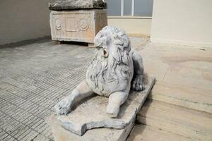 Ancient Marble statue of a lion photo