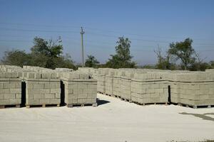 Cinder blocks, which lie in the bays. Storage cinder block photo
