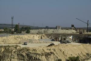 Large quarry for gravel mining, sand and clay. Mining machines and units. Mining photo